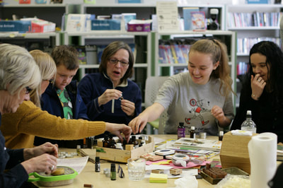 Balm making workshop at Formby Library using the apiary's own beeswax